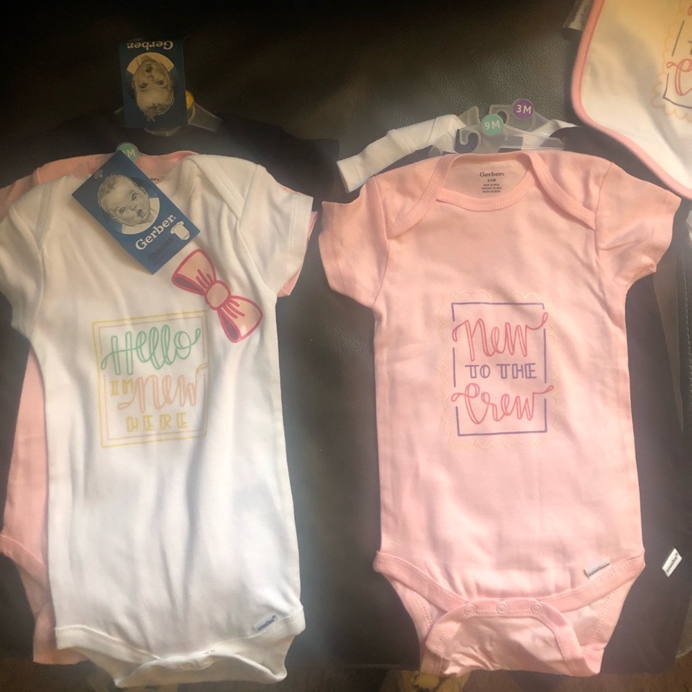 Infants onesies with designs on each